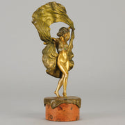Windy Day by Franz Bergman a sensuous early 20th century erotic Austrian bronze figurine of a young dancer with fine cold painted colour and good detail, the skirt hinged to lift and reveal her naked body