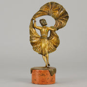 Windy Day by Franz Bergman a sensuous early 20th century erotic Austrian bronze figurine of a young dancer with fine cold painted colour and good detail, the skirt hinged to lift and reveal her naked body