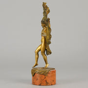 Windy Day by Franz Bergman a sensuous early 20th century erotic Austrian bronze figurine of a young dancer with fine cold painted colour and good detail, the skirt hinged to lift and reveal her naked body