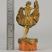 Windy Day by Franz Bergman a sensuous early 20th century erotic Austrian bronze figurine of a young dancer with fine cold painted colour and good detail, the skirt hinged to lift and reveal her naked body