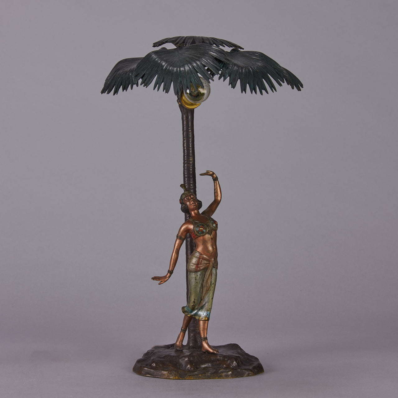 Woman Under Palm Tree Lamp by Franz Bergman Very fine early 20th Century Vienna bronze table lamp modelled as an Orientalist dancer by the side of a palm tree fitted with a light under its palms
