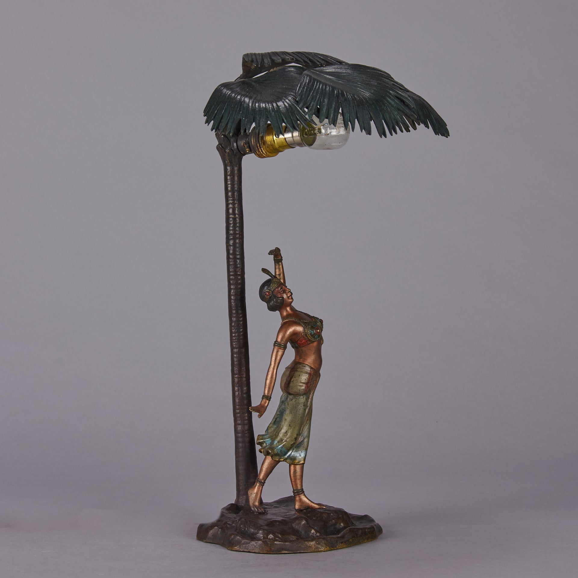 Woman Under Palm Tree Lamp by Franz Bergman Very fine early 20th Century Vienna bronze table lamp modelled as an Orientalist dancer by the side of a palm tree fitted with a light under its palms