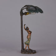 Woman Under Palm Tree Lamp by Franz Bergman Very fine early 20th Century Vienna bronze table lamp modelled as an Orientalist dancer by the side of a palm tree fitted with a light under its palms