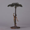 Woman Under Palm Tree Lamp by Franz Bergman Very fine early 20th Century Vienna bronze table lamp modelled as an Orientalist dancer by the side of a palm tree fitted with a light under its palms