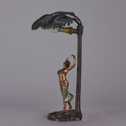 Woman Under Palm Tree Lamp by Franz Bergman Very fine early 20th Century Vienna bronze table lamp modelled as an Orientalist dancer by the side of a palm tree fitted with a light under its palms