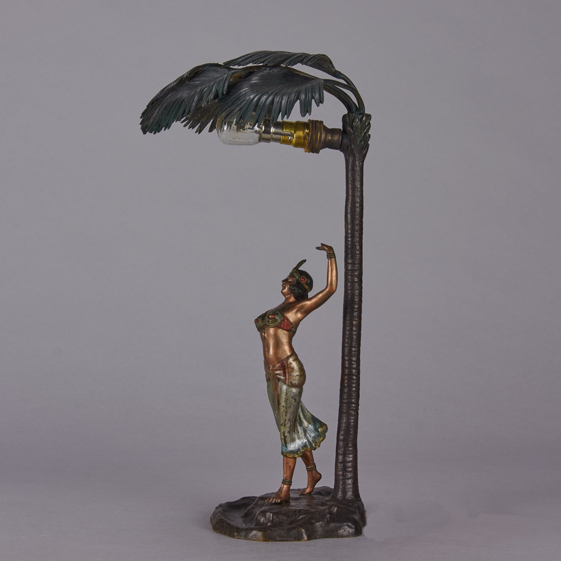 Woman Under Palm Tree Lamp by Franz Bergman Very fine early 20th Century Vienna bronze table lamp modelled as an Orientalist dancer by the side of a palm tree fitted with a light under its palms