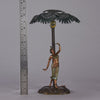 Woman Under Palm Tree Lamp by Franz Bergman Very fine early 20th Century Vienna bronze table lamp modelled as an Orientalist dancer by the side of a palm tree fitted with a light under its palms