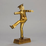 Art Deco Bronze Figurine Yo Yo by Gallo Gilt Bronze Sculpture of a young man dressed in period sailor boy attire performing tricks with his yo-yo whilst balancing on one leg. The figure with excellent hand carved detail and fine golden colour 