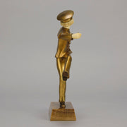 Art Deco Bronze Figurine Yo Yo by Gallo Gilt Bronze Sculpture of a young man dressed in period sailor boy attire performing tricks with his yo-yo whilst balancing on one leg. The figure with excellent hand carved detail and fine golden colour 