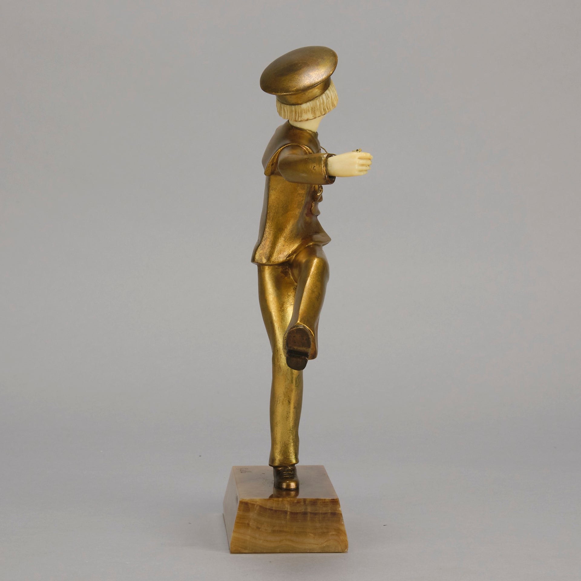 Art Deco Bronze Figurine Yo Yo by Gallo Gilt Bronze Sculpture of a young man dressed in period sailor boy attire performing tricks with his yo-yo whilst balancing on one leg. The figure with excellent hand carved detail and fine golden colour 