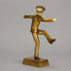 Art Deco Bronze Figurine Yo Yo by Gallo Gilt Bronze Sculpture of a young man dressed in period sailor boy attire performing tricks with his yo-yo whilst balancing on one leg. The figure with excellent hand carved detail and fine golden colour 