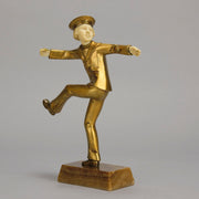 Art Deco Bronze Figurine Yo Yo by Gallo Gilt Bronze Sculpture of a young man dressed in period sailor boy attire performing tricks with his yo-yo whilst balancing on one leg. The figure with excellent hand carved detail and fine golden colour 