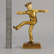 Art Deco Bronze Figurine Yo Yo by Gallo Gilt Bronze Sculpture of a young man dressed in period sailor boy attire performing tricks with his yo-yo whilst balancing on one leg. The figure with excellent hand carved detail and fine golden colour 