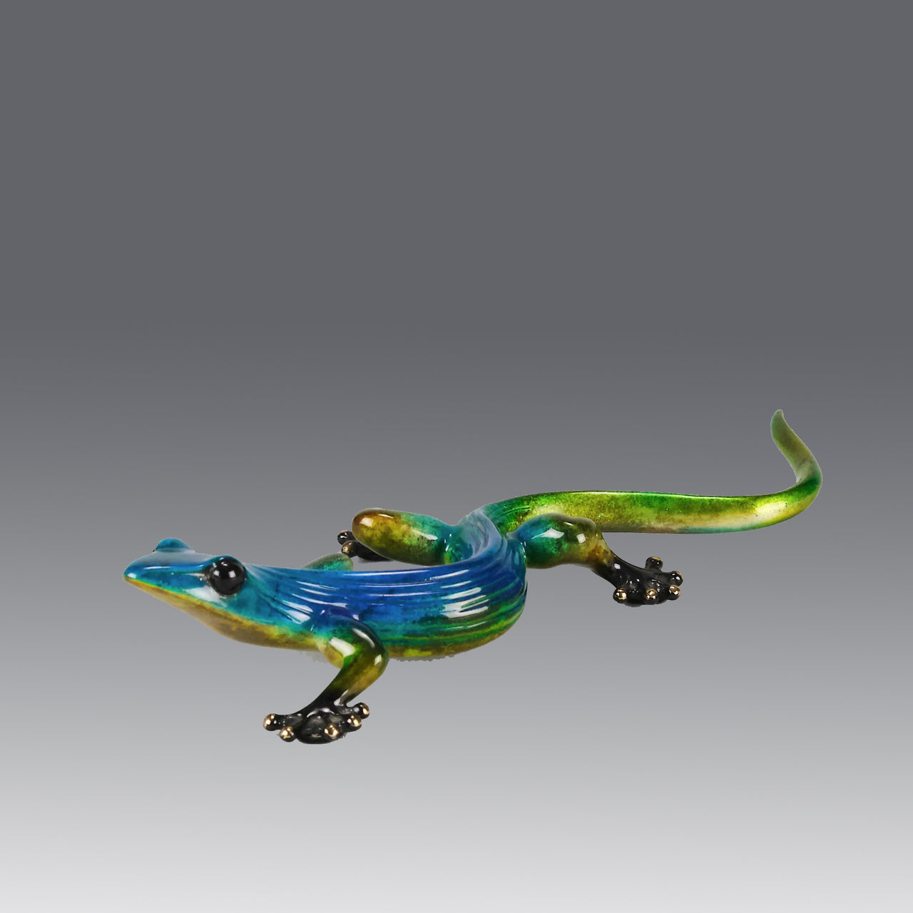 Margarita Gecko by Tim Cotterill a bronze study of a gecko with its head raised exhibiting very fine vibrant colours and excellent surface detail