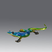Margarita Gecko by Tim Cotterill a bronze study of a gecko with its head raised exhibiting very fine vibrant colours and excellent surface detail