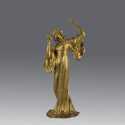 Art Nouveau Dancer by Hermann Eichberg an attractive late 19th Century Art Nouveau gilt bronze study of a beauty dressed in period attire with her hair tied back enjoying a dance.