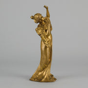 Art Nouveau Dancer by Hermann Eichberg an attractive late 19th Century Art Nouveau gilt bronze study of a beauty dressed in period attire with her hair tied back enjoying a dance.
