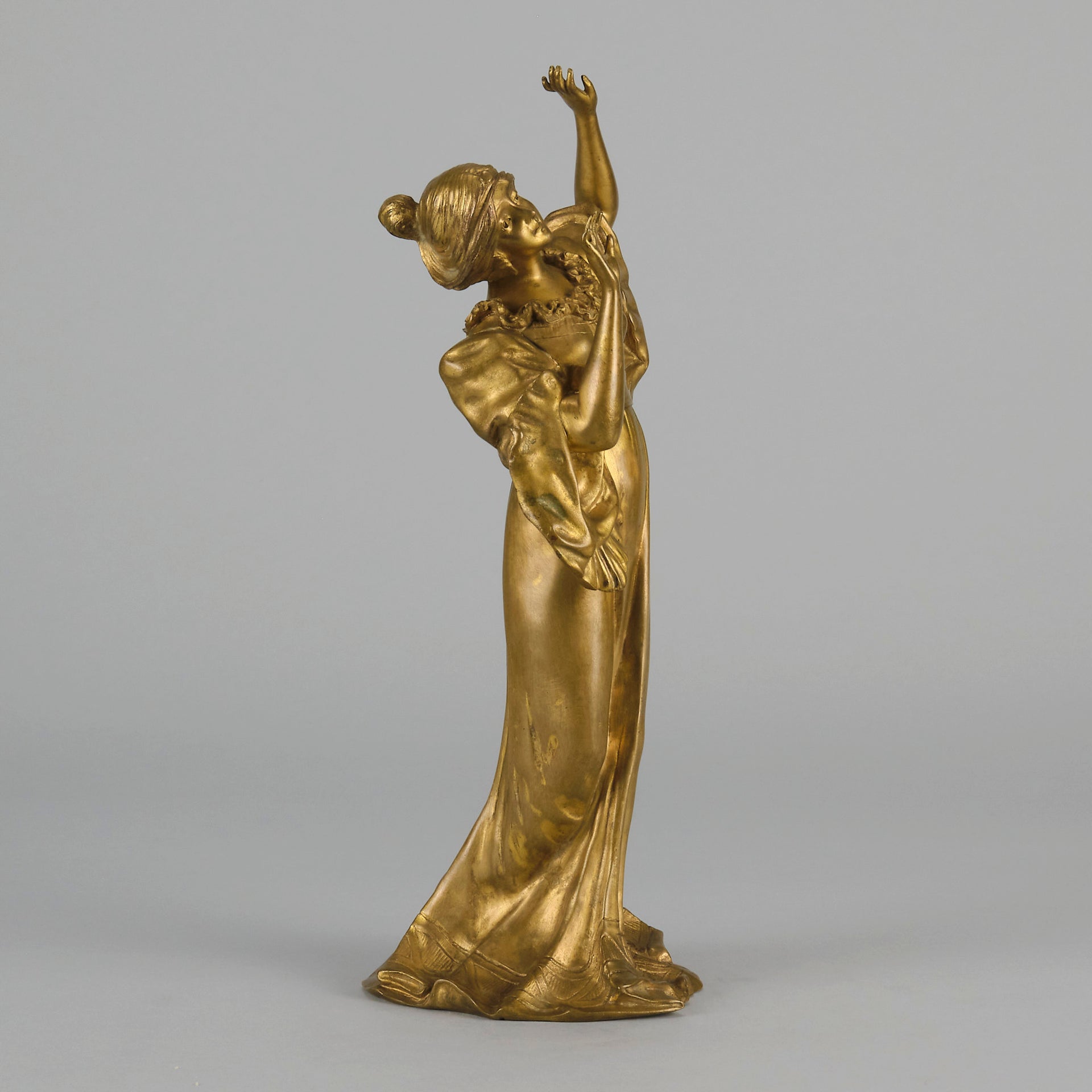 Art Nouveau Dancer by Hermann Eichberg an attractive late 19th Century Art Nouveau gilt bronze study of a beauty dressed in period attire with her hair tied back enjoying a dance.