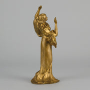 Art Nouveau Dancer by Hermann Eichberg an attractive late 19th Century Art Nouveau gilt bronze study of a beauty dressed in period attire with her hair tied back enjoying a dance.