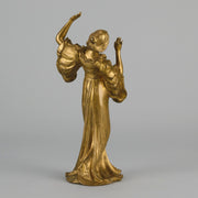 Art Nouveau Dancer by Hermann Eichberg an attractive late 19th Century Art Nouveau gilt bronze study of a beauty dressed in period attire with her hair tied back enjoying a dance.