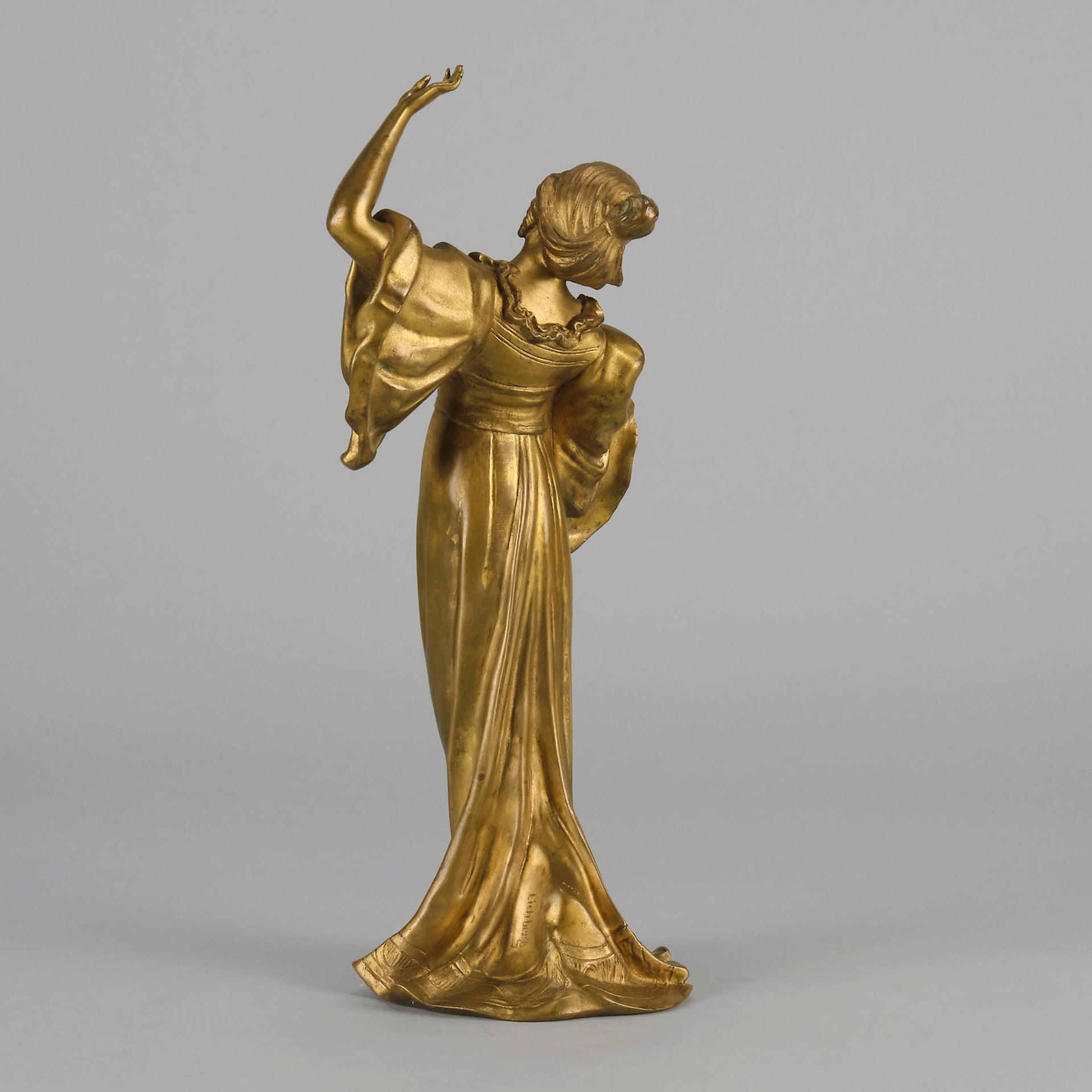 Art Nouveau Dancer by Hermann Eichberg an attractive late 19th Century Art Nouveau gilt bronze study of a beauty dressed in period attire with her hair tied back enjoying a dance.
