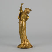 Art Nouveau Dancer by Hermann Eichberg an attractive late 19th Century Art Nouveau gilt bronze study of a beauty dressed in period attire with her hair tied back enjoying a dance.