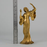 Art Nouveau Dancer by Hermann Eichberg an attractive late 19th Century Art Nouveau gilt bronze study of a beauty dressed in period attire with her hair tied back enjoying a dance.