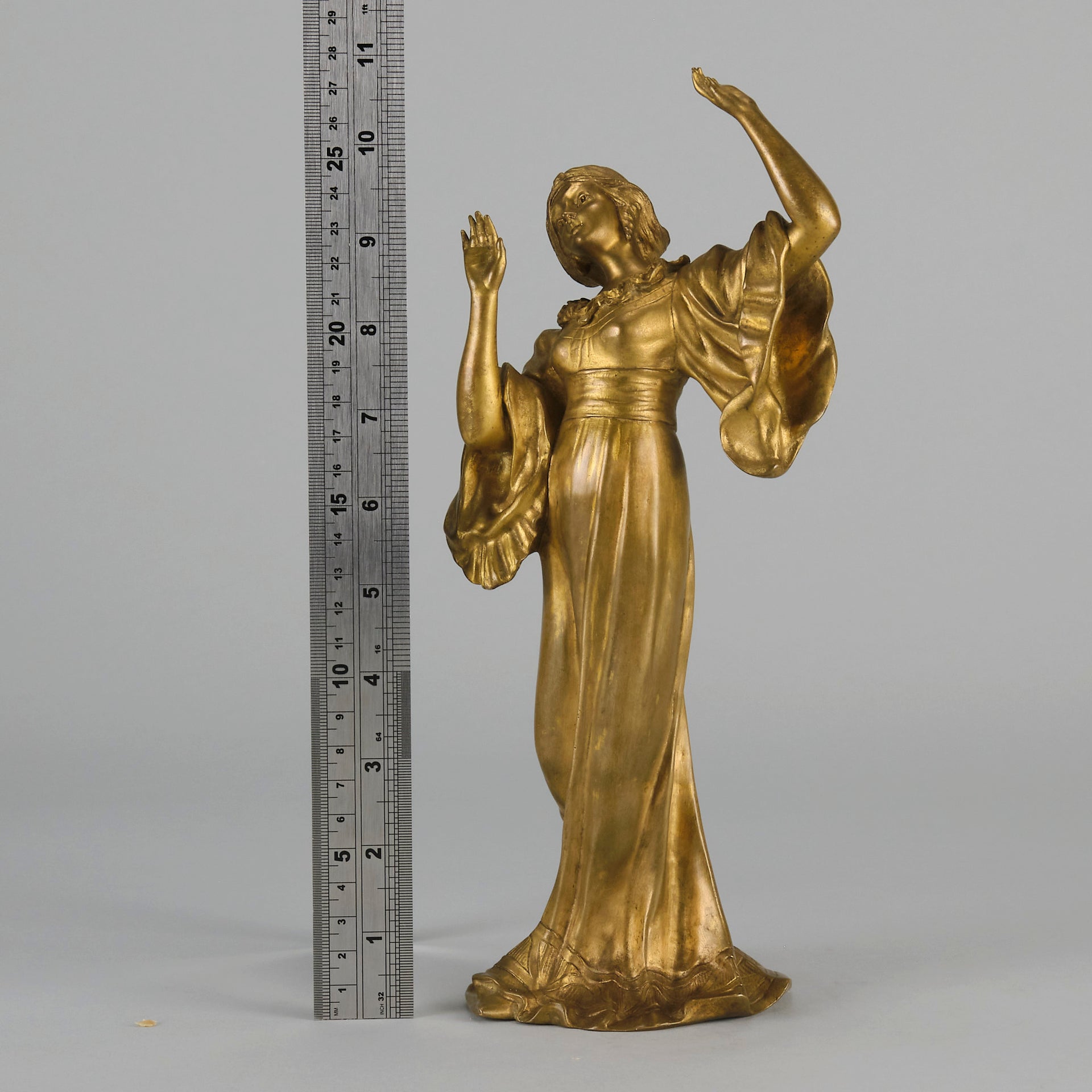 Art Nouveau Dancer by Hermann Eichberg an attractive late 19th Century Art Nouveau gilt bronze study of a beauty dressed in period attire with her hair tied back enjoying a dance.