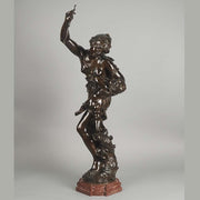 Antique bronze figures Venus & Cupid by J Sul-Abadie a study of Venus taking an arrow from Cupid her son, who at times would shoot his arrows without meaning or reason into the hearts of men, igniting their desire