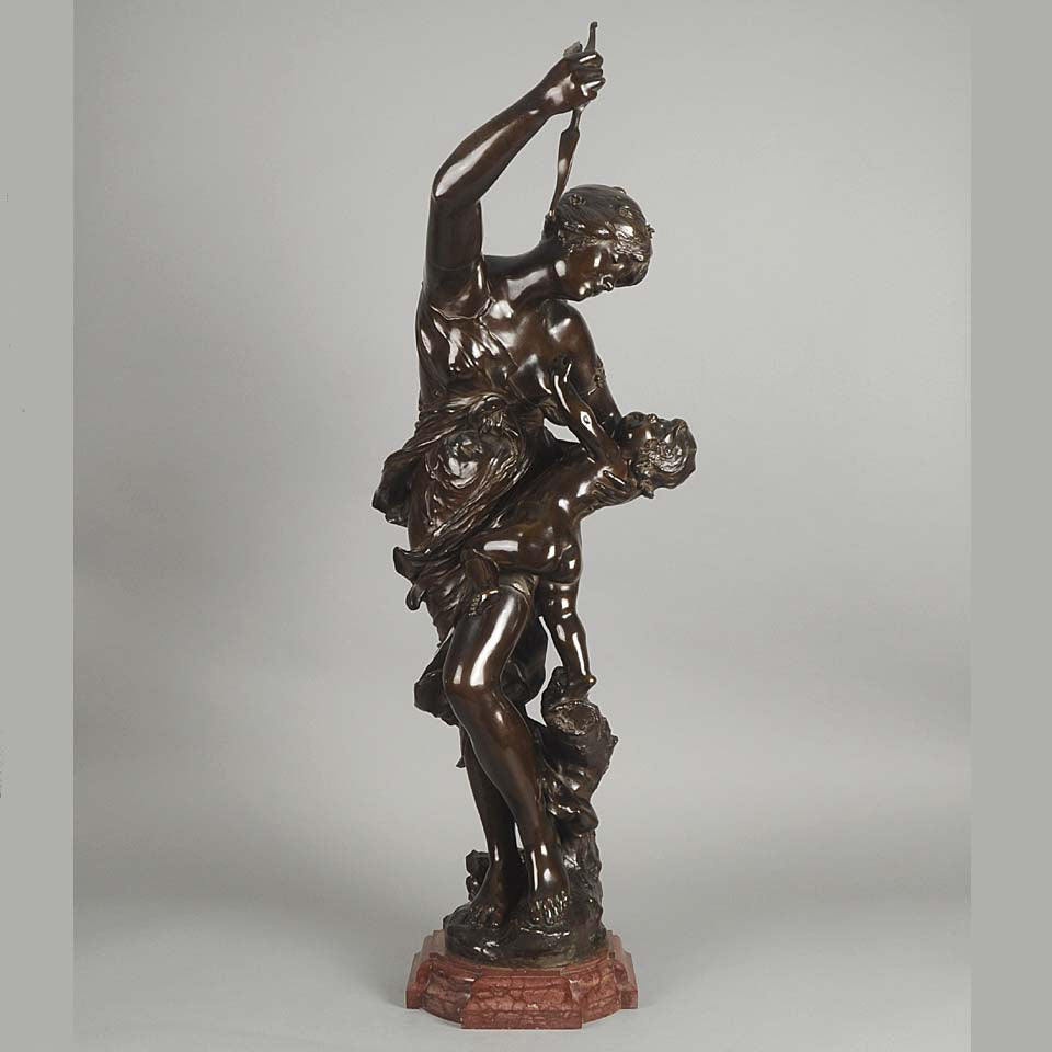 Antique bronze figures Venus & Cupid by J Sul-Abadie a study of Venus taking an arrow from Cupid her son, who at times would shoot his arrows without meaning or reason into the hearts of men, igniting their desire