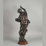 Antique bronze figures Venus & Cupid by J Sul-Abadie a study of Venus taking an arrow from Cupid her son, who at times would shoot his arrows without meaning or reason into the hearts of men, igniting their desire