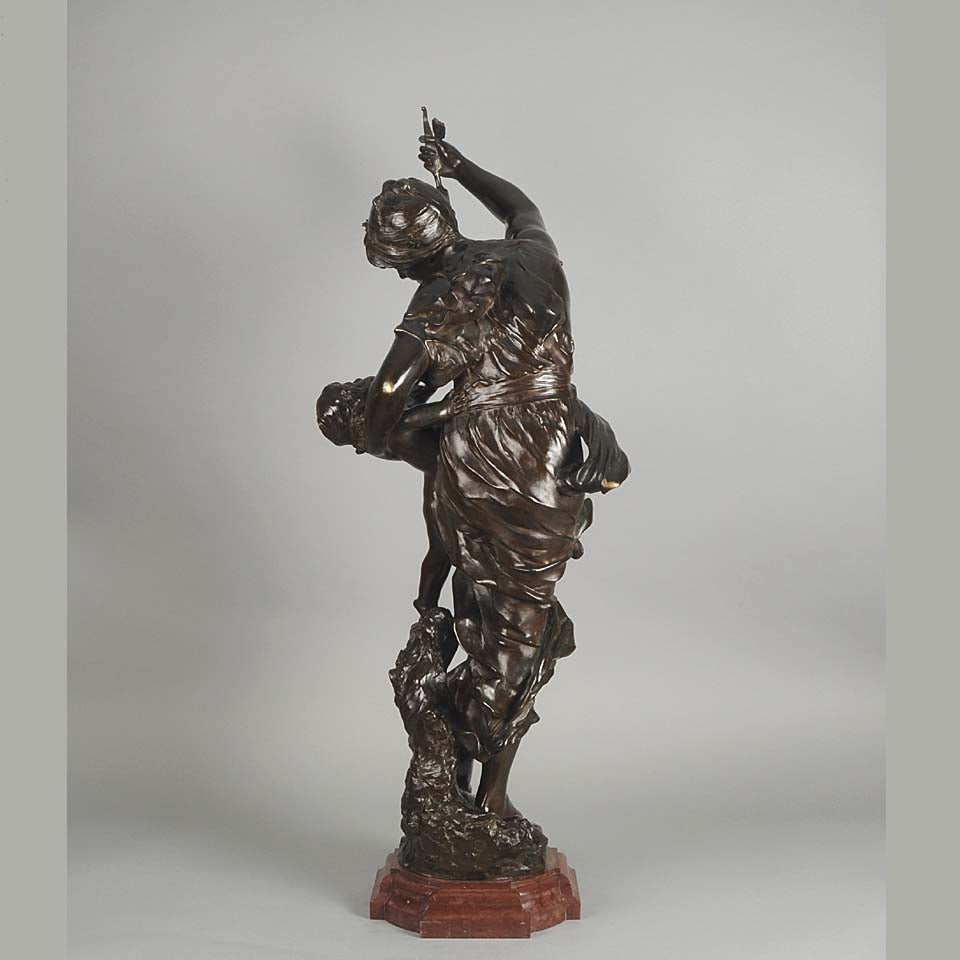 Antique bronze figures Venus & Cupid by J Sul-Abadie a study of Venus taking an arrow from Cupid her son, who at times would shoot his arrows without meaning or reason into the hearts of men, igniting their desire