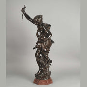 Antique bronze figures Venus & Cupid by J Sul-Abadie a study of Venus taking an arrow from Cupid her son, who at times would shoot his arrows without meaning or reason into the hearts of men, igniting their desire