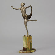 Dancer with Shawl by Josef Lorenzl art deco bronze figurine of a dancer holding an energetic pose wearing nothing but a shawl around her waist. The bronze exhibiting excellent colour and very fine hand chased surface detail, raised on a green onyx base