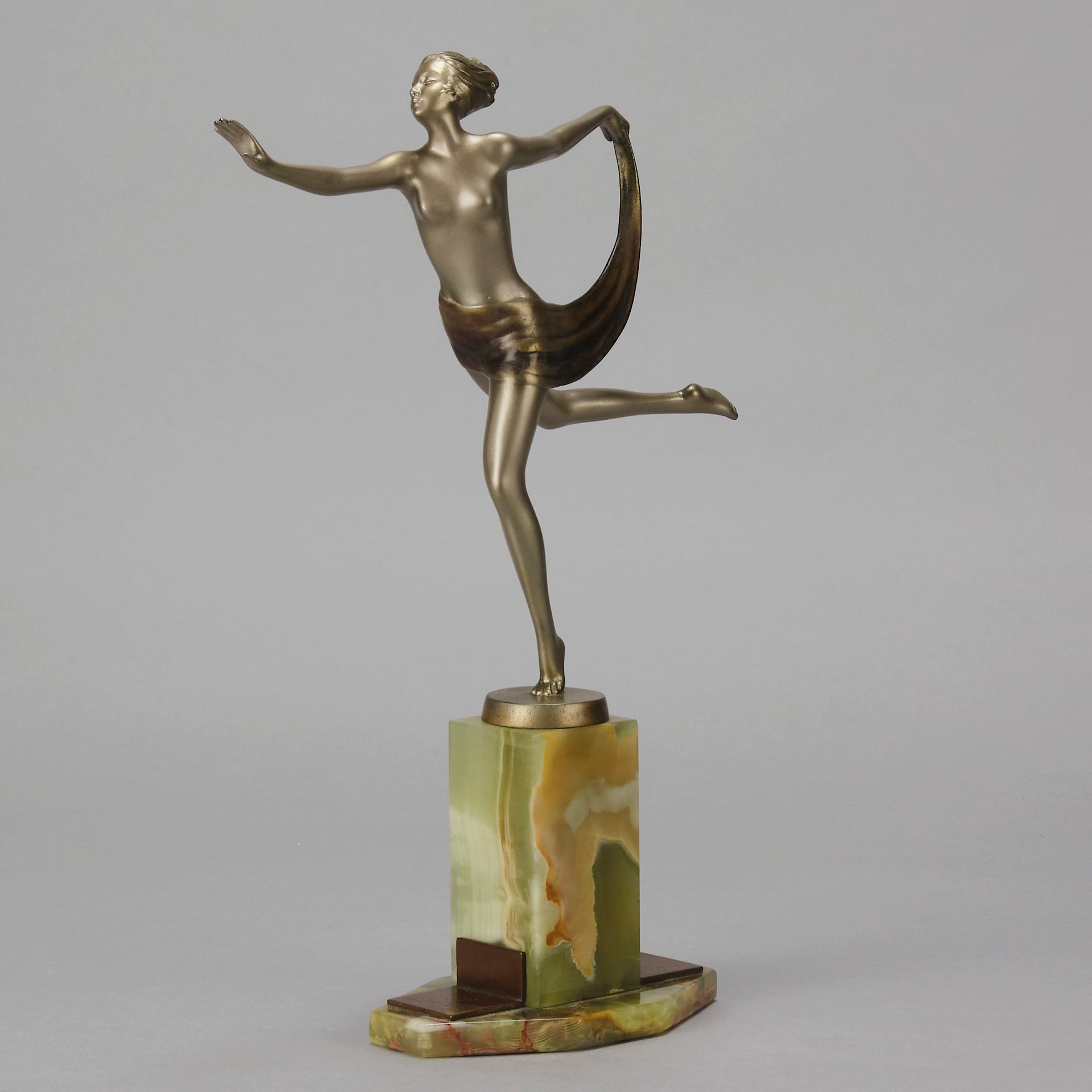 Dancer with Shawl by Josef Lorenzl art deco bronze figurine of a dancer holding an energetic pose wearing nothing but a shawl around her waist. The bronze exhibiting excellent colour and very fine hand chased surface detail, raised on a green onyx base