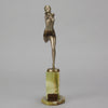 Dancer with Shawl by Josef Lorenzl art deco bronze figurine of a dancer holding an energetic pose wearing nothing but a shawl around her waist. The bronze exhibiting excellent colour and very fine hand chased surface detail, raised on a green onyx base