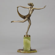 Dancer with Shawl by Josef Lorenzl art deco bronze figurine of a dancer holding an energetic pose wearing nothing but a shawl around her waist. The bronze exhibiting excellent colour and very fine hand chased surface detail, raised on a green onyx base