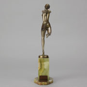 Dancer with Shawl by Josef Lorenzl art deco bronze figurine of a dancer holding an energetic pose wearing nothing but a shawl around her waist. The bronze exhibiting excellent colour and very fine hand chased surface detail, raised on a green onyx base