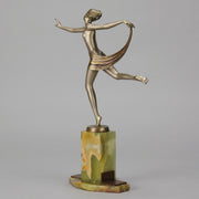 Dancer with Shawl by Josef Lorenzl art deco bronze figurine of a dancer holding an energetic pose wearing nothing but a shawl around her waist. The bronze exhibiting excellent colour and very fine hand chased surface detail, raised on a green onyx base
