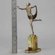 Dancer with Shawl by Josef Lorenzl art deco bronze figurine of a dancer holding an energetic pose wearing nothing but a shawl around her waist. The bronze exhibiting excellent colour and very fine hand chased surface detail, raised on a green onyx base