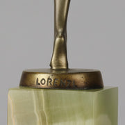 Dancer with Shawl by Josef Lorenzl art deco bronze figurine of a dancer holding an energetic pose wearing nothing but a shawl around her waist. The bronze exhibiting excellent colour and very fine hand chased surface detail, raised on a green onyx base