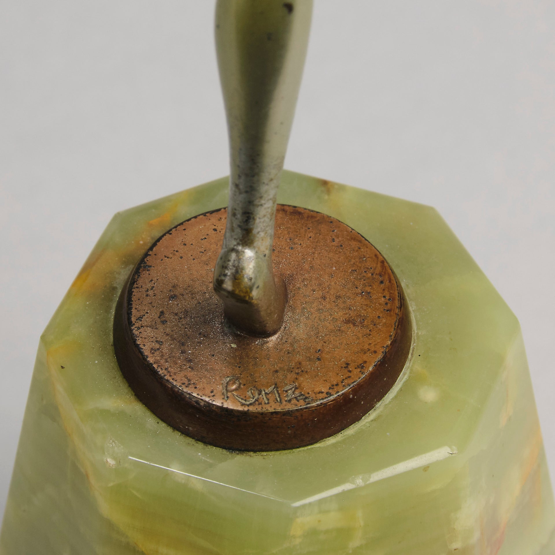 Helga by Josef Lorenzl An Art Deco Bronze and ivory igure of a beautiful dancer holding an elegant pose exhibiting excellent colour and very fine hand chased surface detail, raised on a green onyx base 