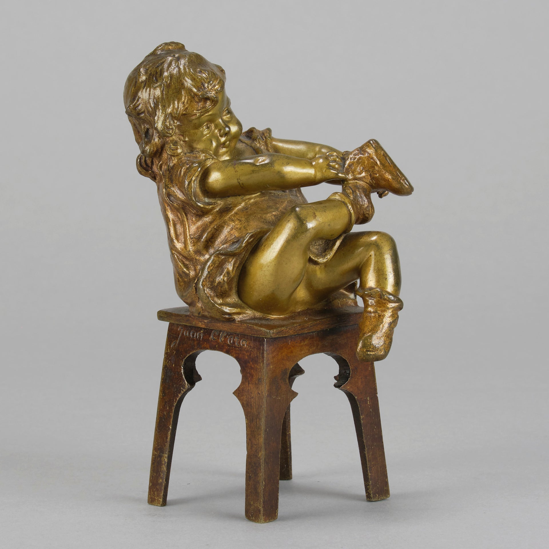 Juan Clara Bronze - Girl Putting On Shoe - Hickmet Fine Arts 