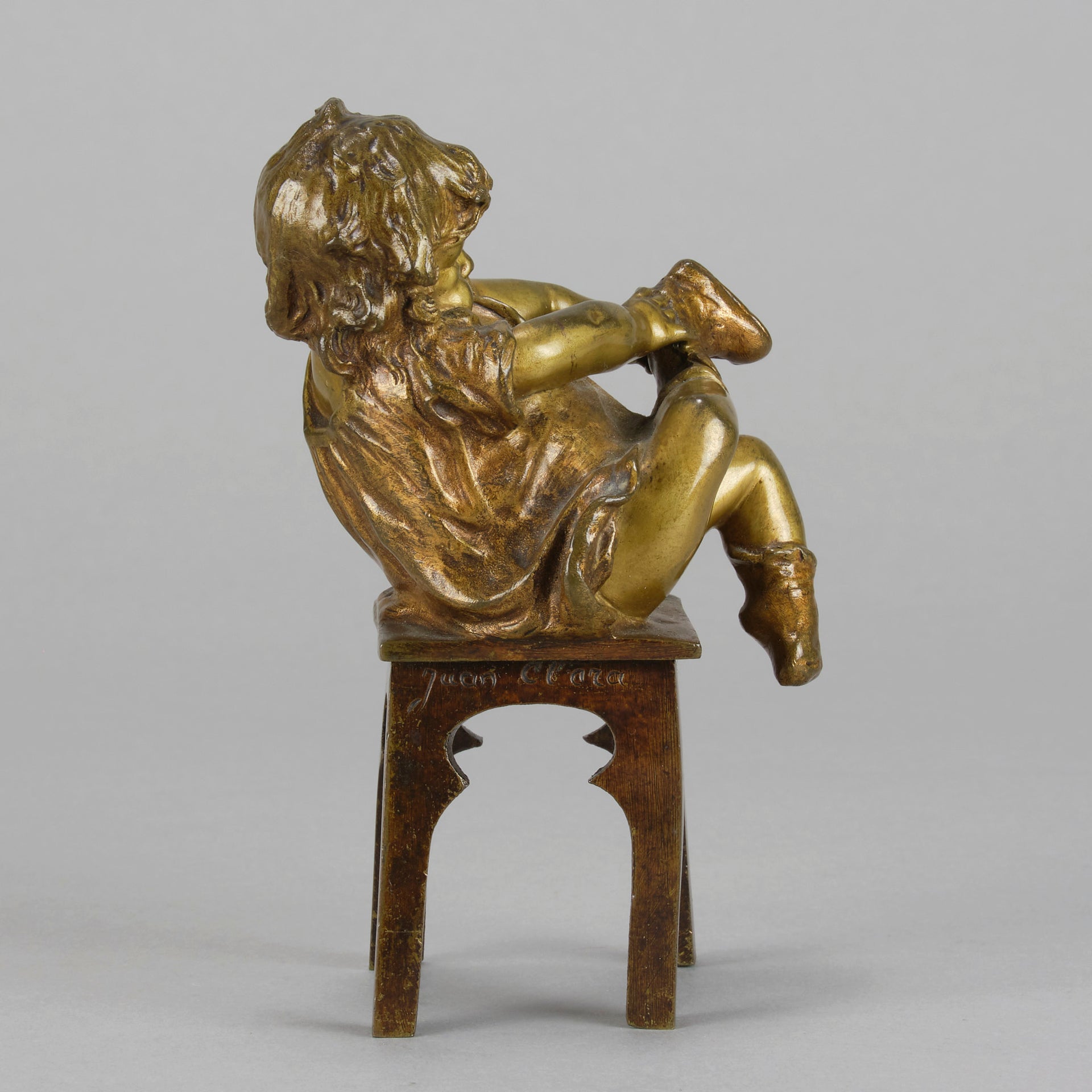 Juan Clara Bronze - Girl Putting On Shoe - Hickmet Fine Arts 