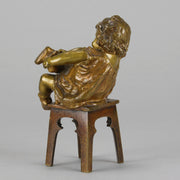 Juan Clara Bronze - Girl Putting On Shoe - Hickmet Fine Arts 