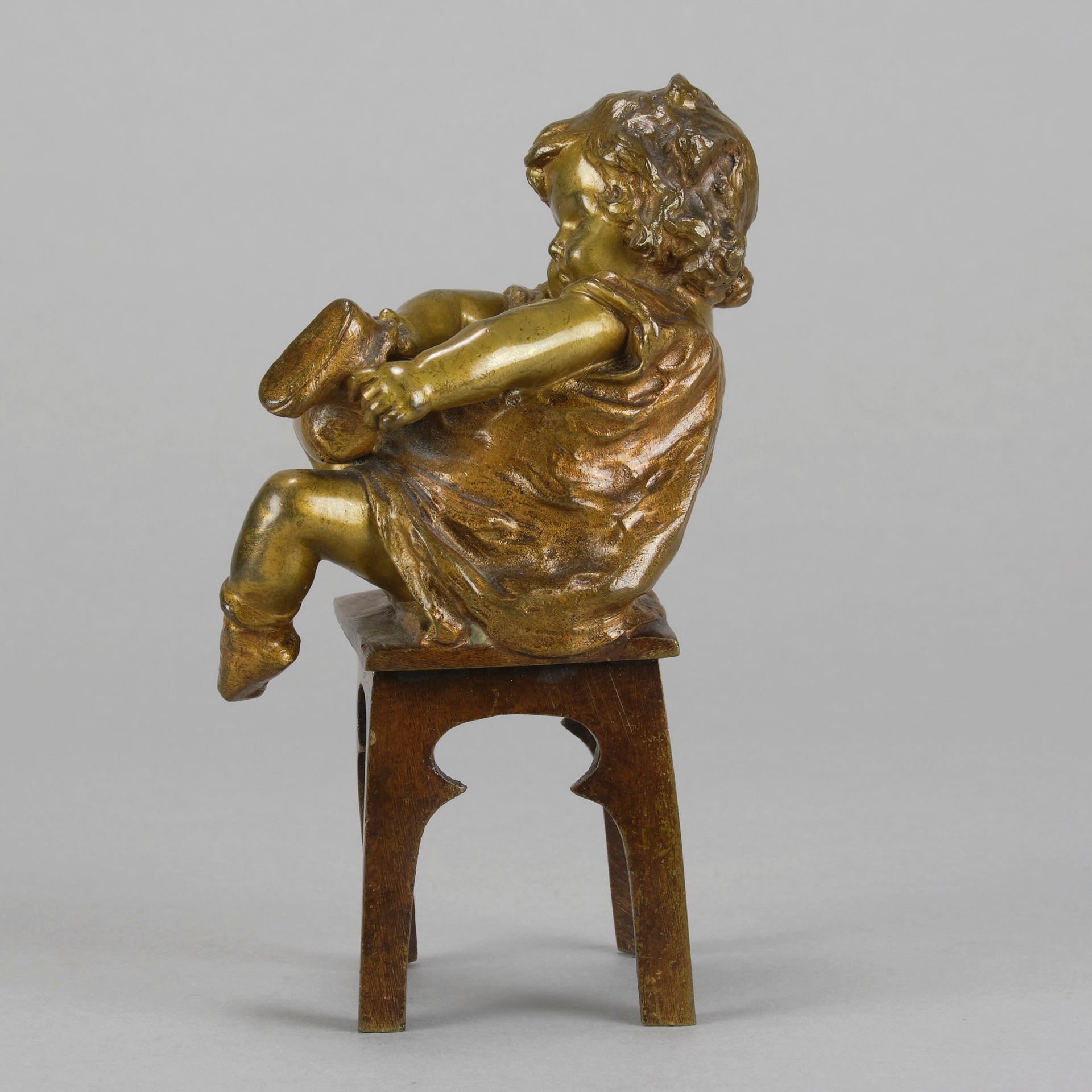Juan Clara Bronze - Girl Putting On Shoe - Hickmet Fine Arts 