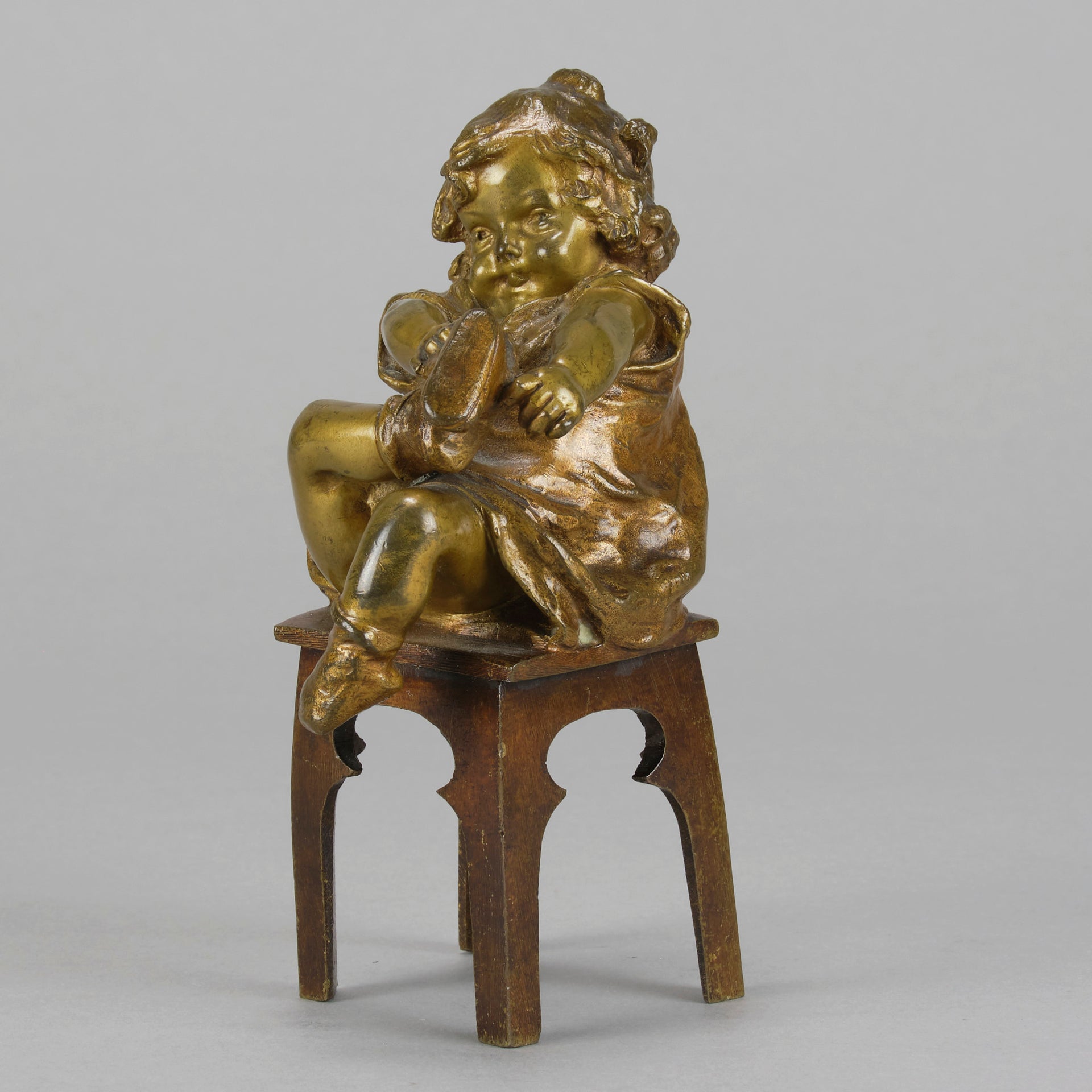 Juan Clara Bronze - Girl Putting On Shoe - Hickmet Fine Arts 