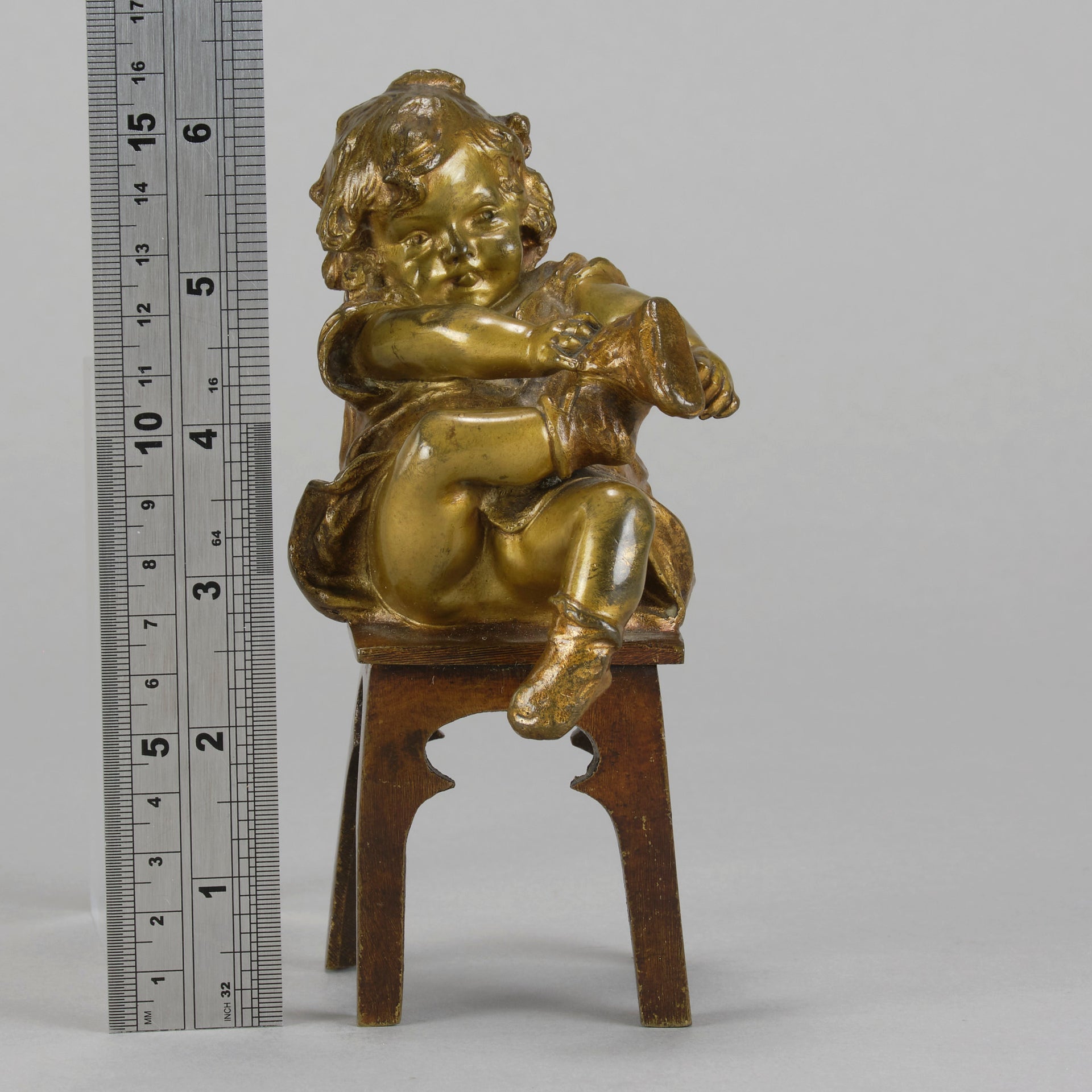 Juan Clara Bronze - Girl Putting On Shoe - Hickmet Fine Arts 