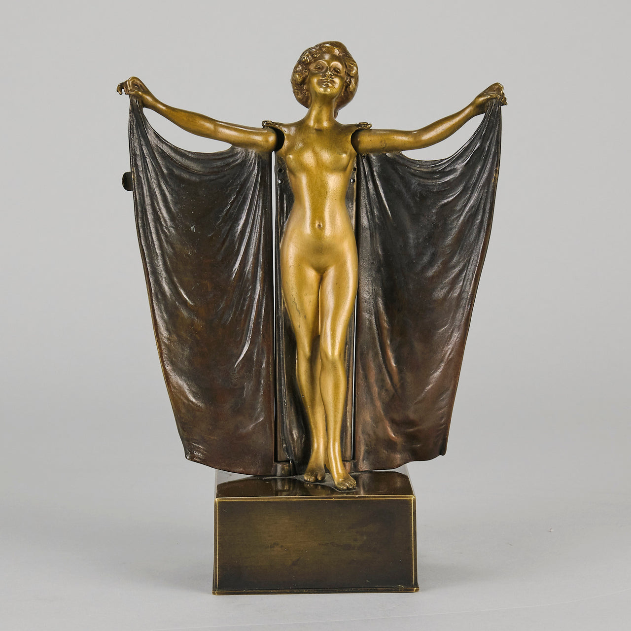 "Cloaked Lady" by Carl Kauba