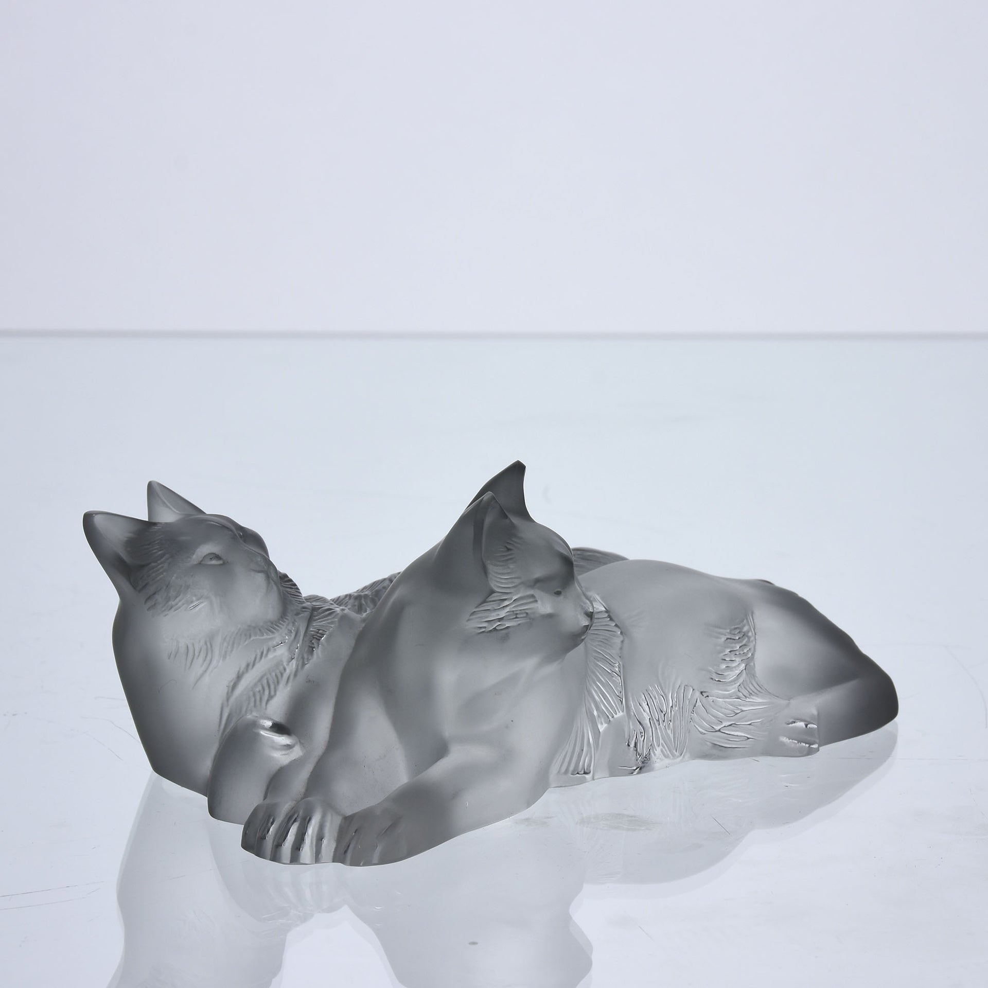 Reclining Cats by Marc Lalique A delightful frosted crystal glass group of two reclining cats resting
